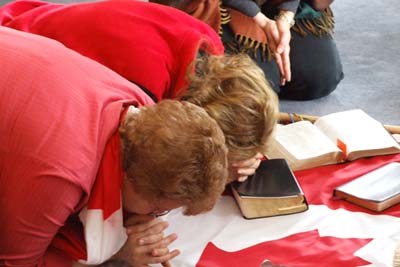 nehemiah-team-praying-over-.jpg